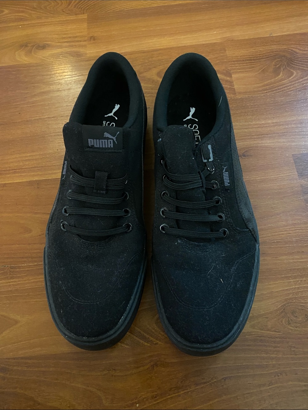 Puma Men's All-Black Low-Top Canvas Sneakers